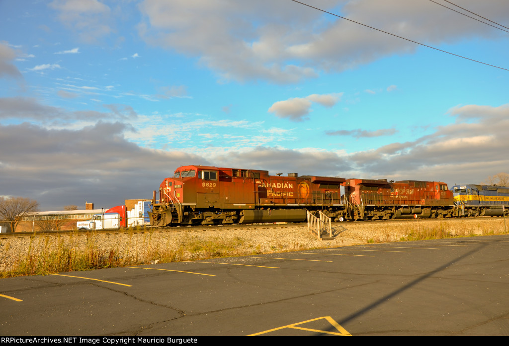 CP AC44CW Locomotives leading a train